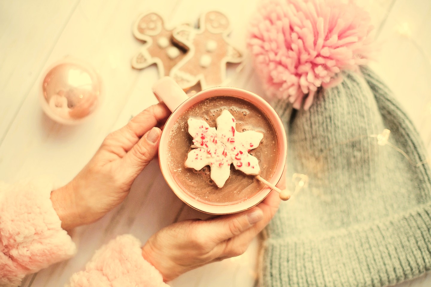 Hot Cacao cup with white cookie and snow hat