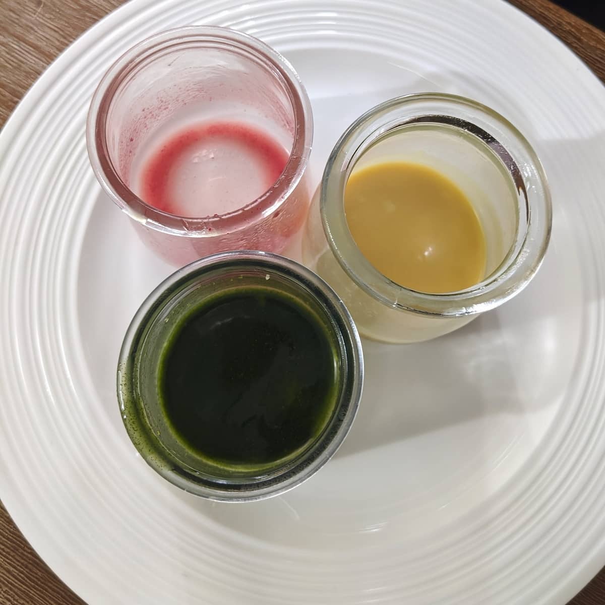 Colored cocoa butter in glass jars